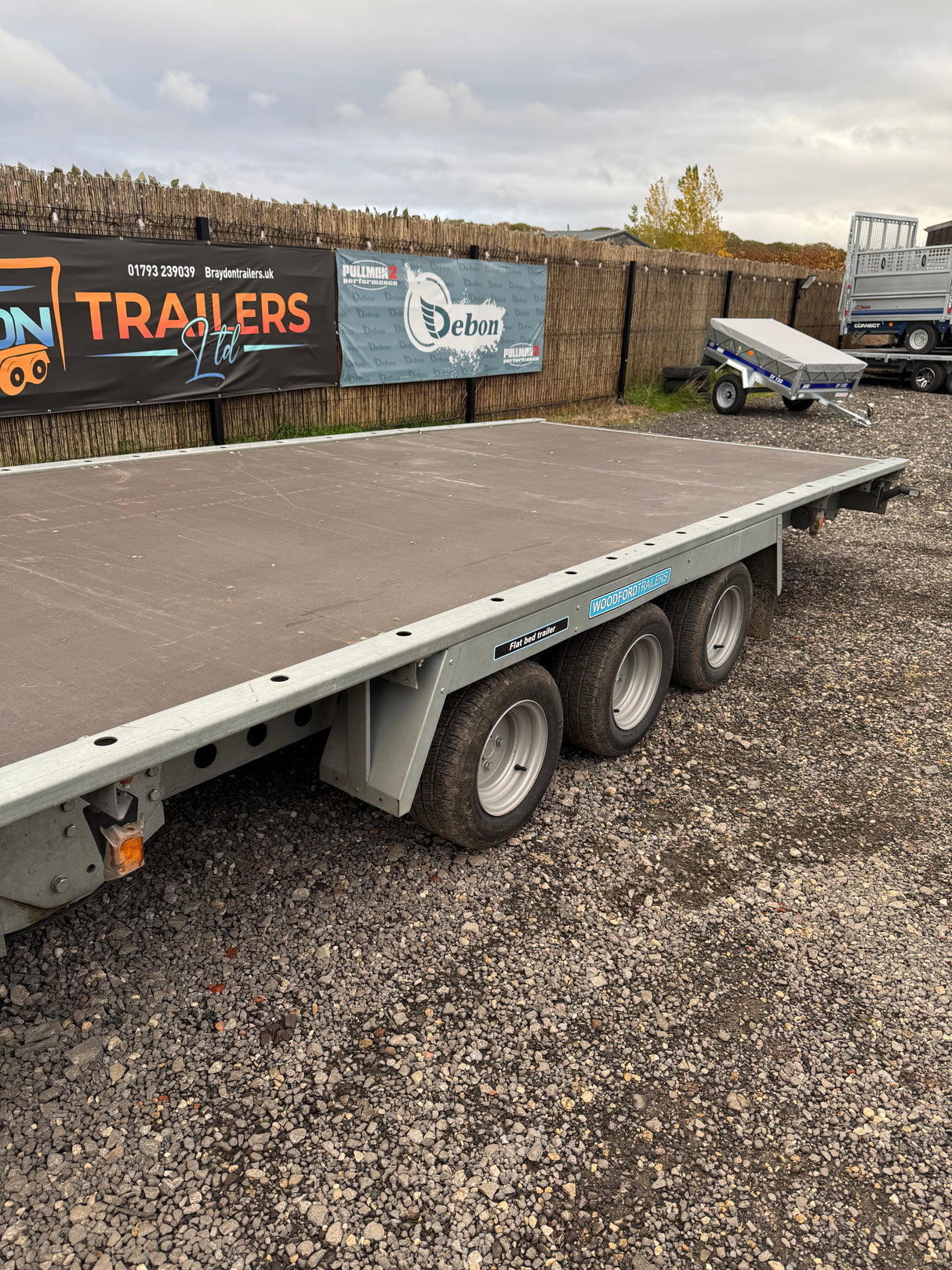 Woodford FBT231 Flatbed 18’x7’3” 5500 x 2220mm 3500kg Tri Axle Tilt Bed Trailer